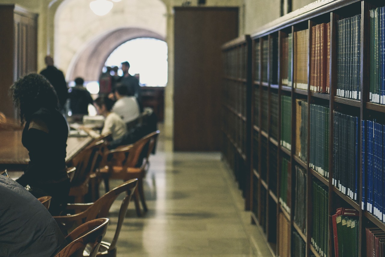 People inside of an old library