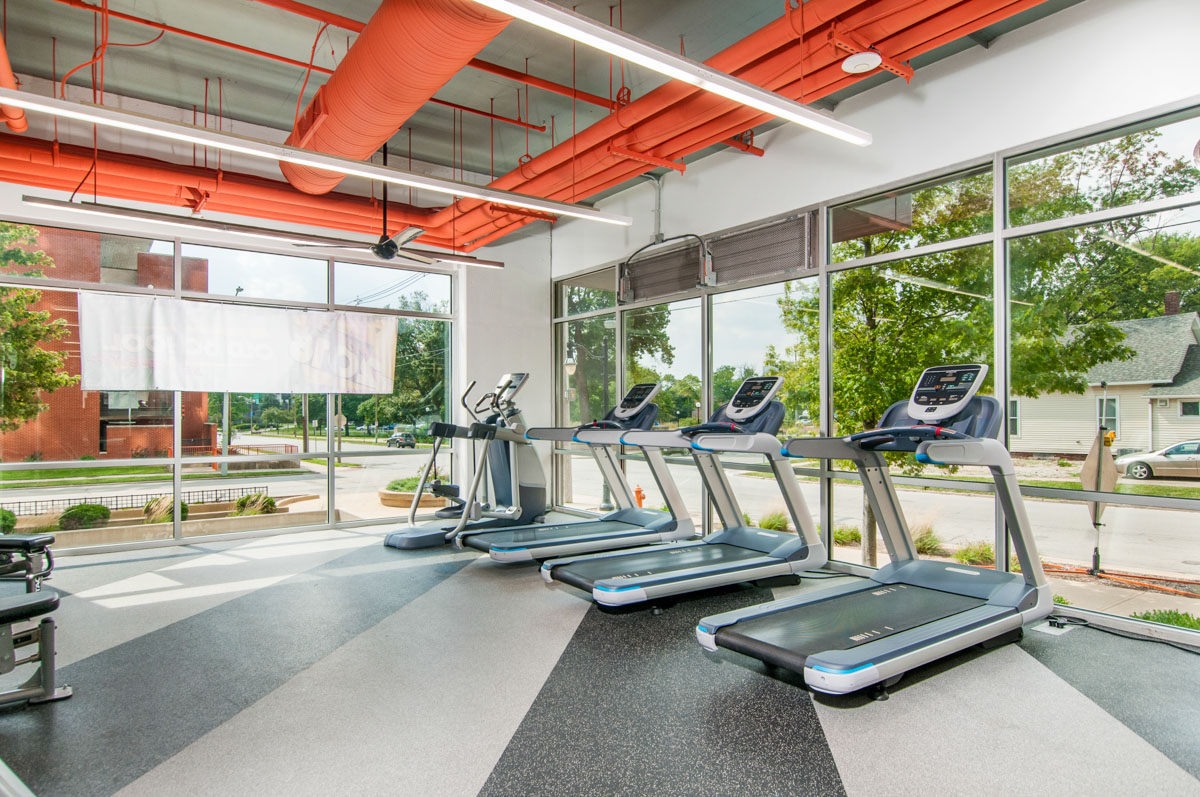 fitness room with treadmills at burnham 310 apartments
